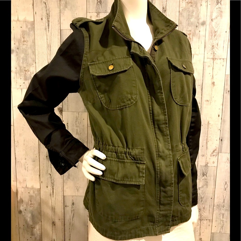 ANA army green anorak jacket with black sleeves.